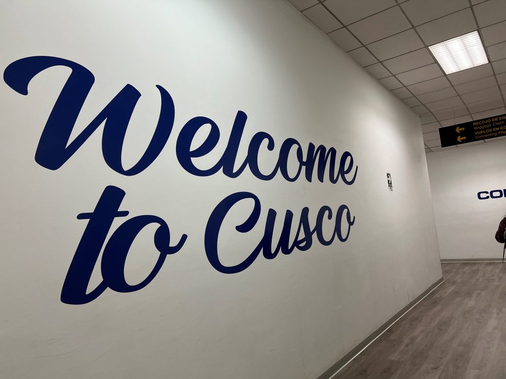 Welcome to Cusco painted on white wall