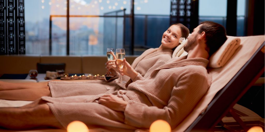 A couple enjoying champagne and relaxation